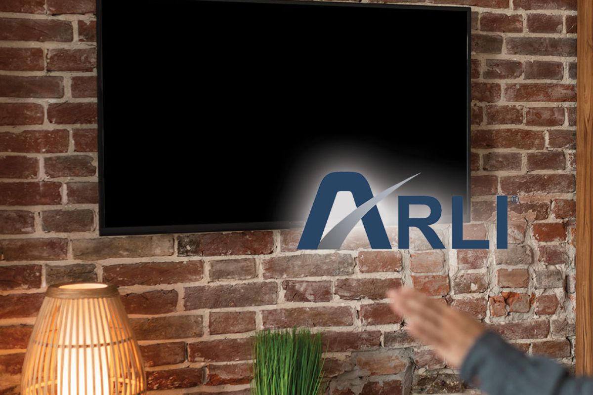 surprised worried sad cheerful mature asian male watching tv with blank screen raising hands a15833a1